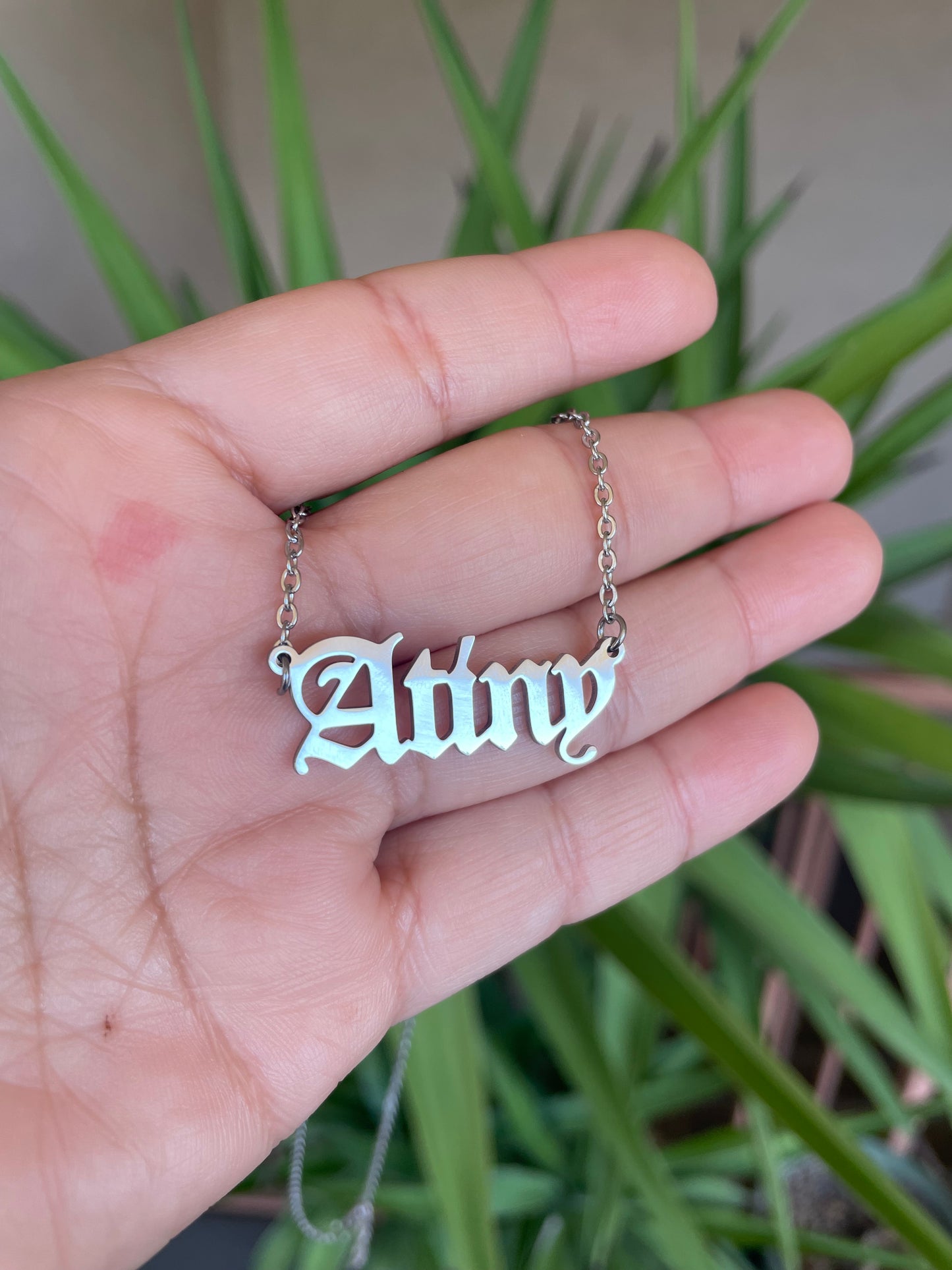 Atiny Nameplate